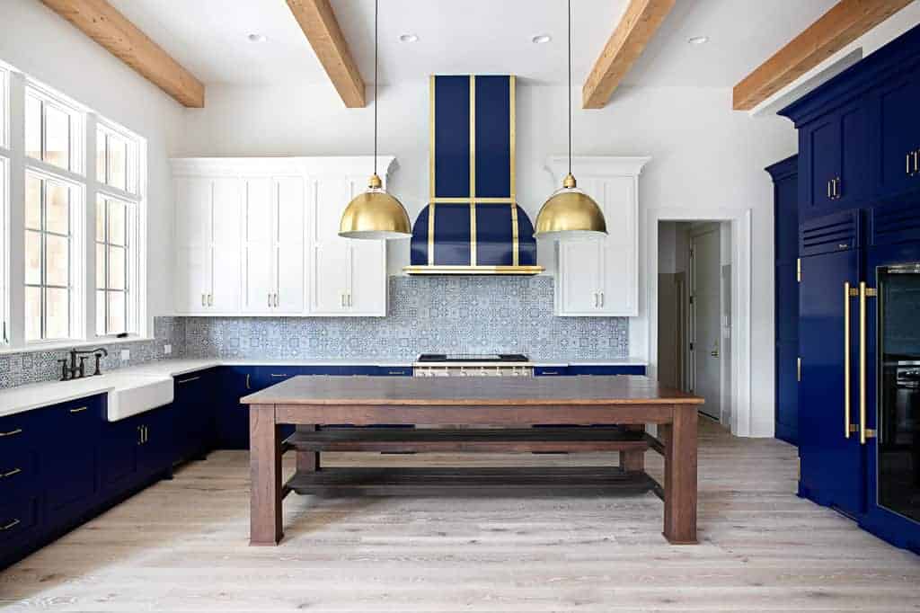 Blue kitchen featuring light stain matte finish wire brush textures hardwood floors by textures nashville