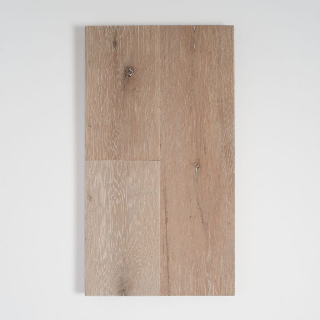 This image shows a rectangular wooden plank with a natural grain pattern, mounted on a white wall, casting a slight shadow on the right from the Jeffrey Dungan Line by Textures Nashville.